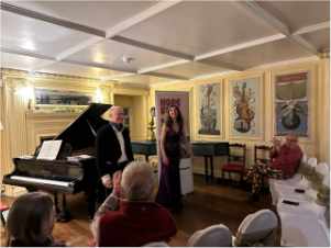 Peter Cowdrey and Kate Durran on stage in the Long Gallery at Fingask Castle