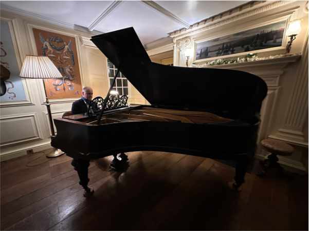 Peter Cowdrey playing piano at Fingask Castle